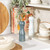 Set of two Salter salt and pepper mills in white and teal on kitchen countertop