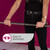 Person holding a metal barbell with sign reading 'Easy to dismantle'