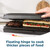 Contact grill cooking a steak and filled baguette with floating hinge lid