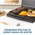 Electric grill with integrated drip tray collecting excess oil and fat