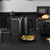 Black Salter kettle and toaster set on kitchen counter with bread and salad