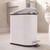 White pedal bathroom bin with lid open