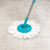 Grey and teal plastic mop bucket with wringer, close-up product image