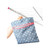 Blue star print peg bag with pink trim, shown hanging on rotary clothesline.