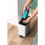 Blue and grey reusable lint remover brush in holder, Beldray branding visible