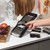 Set of four black and silver slicer and grater blades for food preparation