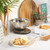 Digital kitchen scale with stainless steel bowl on worktop, suitable for baking or cooking