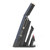 Cordless handheld vacuum cleaner in navy, upright on charging base with attachments