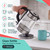 Glass kettle pouring hot water into a mug