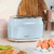 Blue 2-slice toaster on kitchen counter, Salter branding visible.
