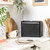 Black metal bread bin on kitchen worktop, shown in modern UK home setting