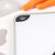 White kitchen scale with 15kg max weight label, carrots on worktop