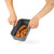 Grey collapsible food container with fried chicken pieces, held by two hands