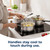 Stainless steel saucepans on induction hob, heat-resistant dual-material handles shown in use