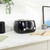 Black four-slice toaster on kitchen worktop