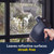 Handheld steam cleaner cleaning soapy window, shown streak-free for reflective surfaces