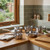 Set of six silver stainless steel saucepans and frying pan on kitchen worktop
