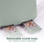 Sage green toaster with removable crumb trays for quick, easy cleaning
