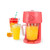 Red slush maker with jug and two cups of colourful ice drinks, shown with orange slices