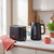 Black toaster and kettle set with wood accents on kitchen counter