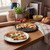 Freshly baked Margherita pizza with tomato, mozzarella, and basil on kitchen counter
