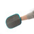 Grey double-sided cleaning mitt with teal edge shown on a person's hand