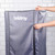 Grey Beldray clothes airer cover with zip, shown in use against tiled wall
