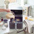Grey Salter air fryer with muffin tray being filled with batter