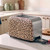 Beige leopard print two-slice toaster with crumb tray open