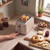 Beige four-slice toaster with bagels on a kitchen worktop