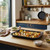 Oven tray with roasted vegetables, shown in a home kitchen.