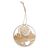Austin Texas wooden round ornament with skyline, bats, Capitol building and guitar cutout, laser-cut design with twine hanger on white background.