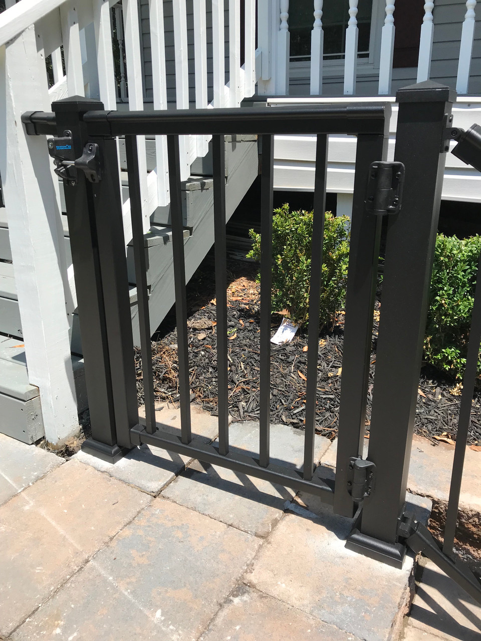 Gate attached to Metal Posts