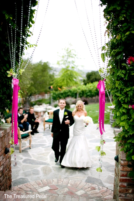 Crystal Garlands Woven Into Wedding Arch