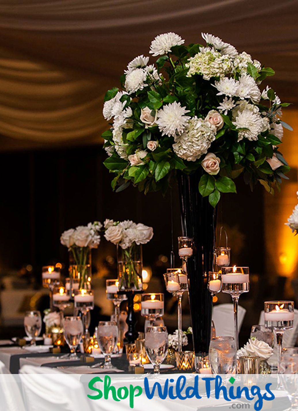 Romantic, dramatic flower arrangements - lots of roses in Eiffel