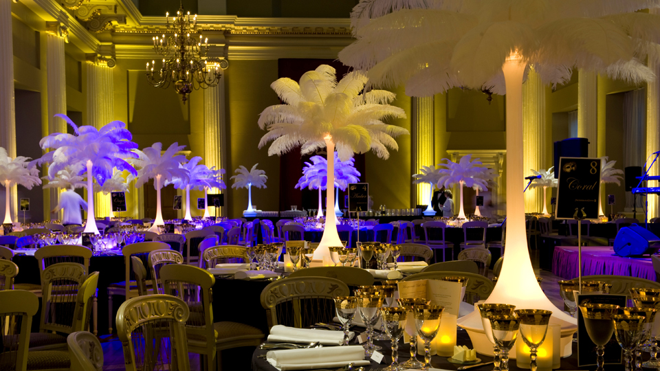 Whimsical White Feather Centerpiece in Wire Vase