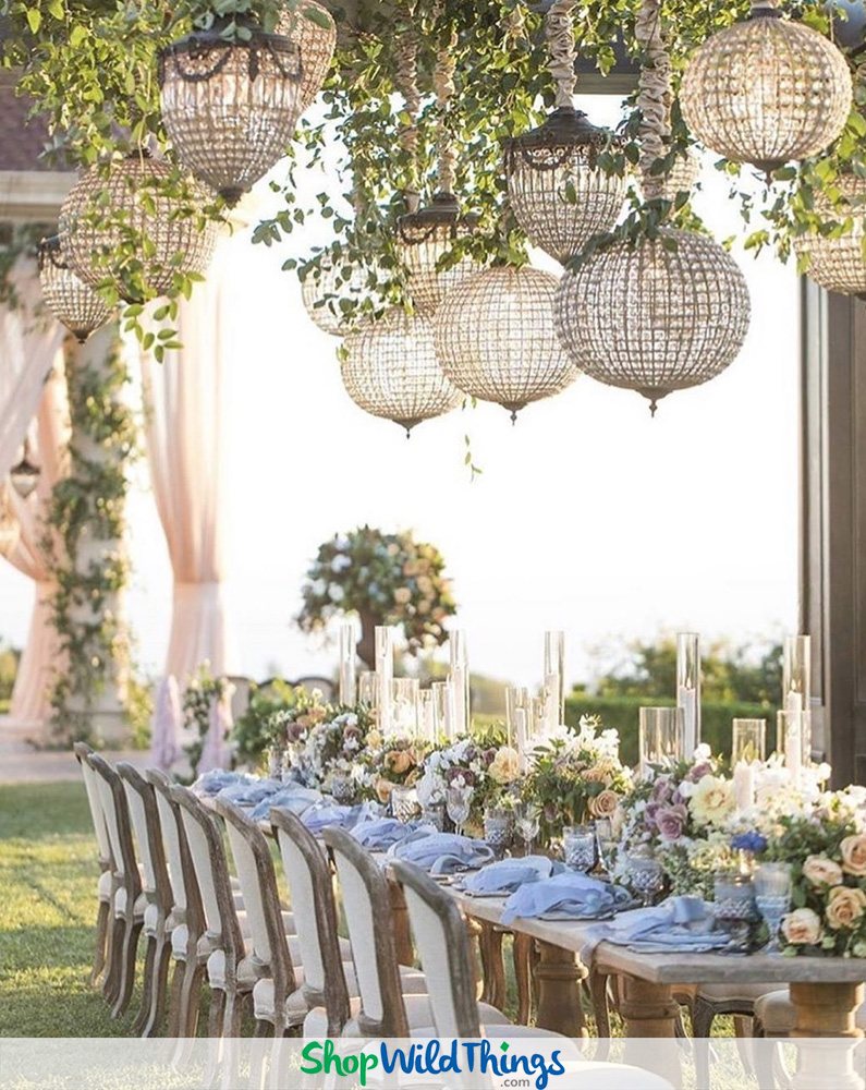 Suspended Florals and Crystal Chandeliers Elevate Tablescapes at Luxury Weddings