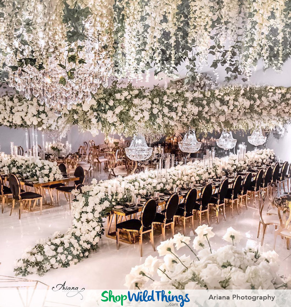 Suspended Florals and Crystal Chandeliers Elevate Tablescapes at Luxury Weddings