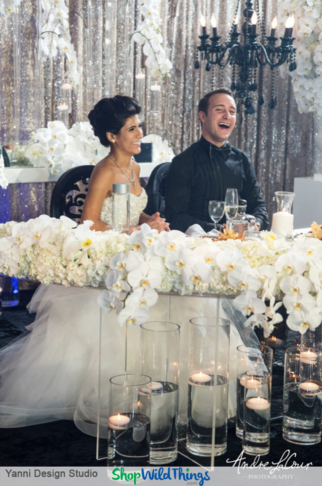 The Key to a Black, White and Romantic All Over Hotel Reception?  Crystals, Chandeliers and Candles