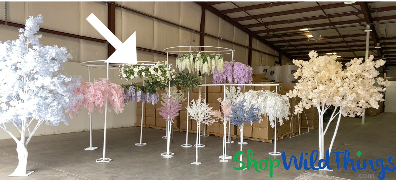 a cascade of flower petals on wire or fishing line  Hanging flowers,  Wedding day inspiration, Floral chandelier