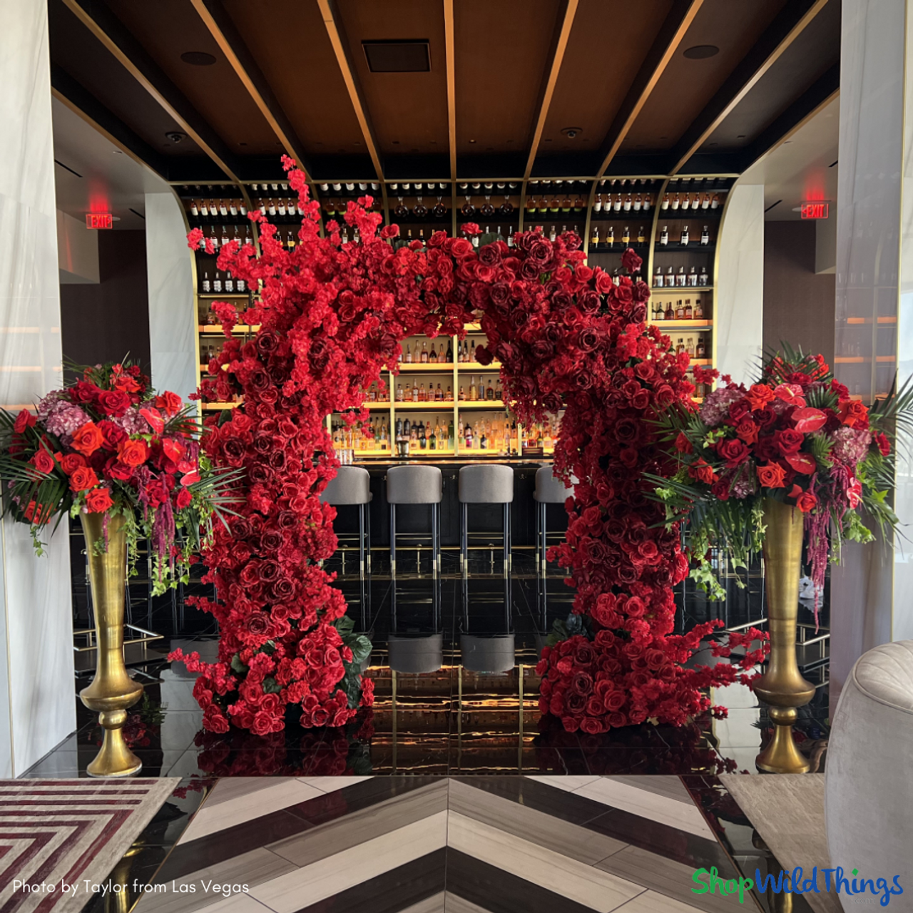 Image of Red dogwood bush as a backdrop for a wedding