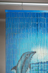 “Dolphin Family” hand-painted bamboo curtain with colorful ocean scene and three dolphins on white background, 35.5" wide x 78" long, ShopWildThings.com