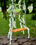 Artificial Greenery Garlands and Florals by ShopWildThings.com are the perfect way to bring the beauty of nature indoors or out. Filter by color and style to find the perfect match for your next photo shoot or event.
Romantic Swing with Wisteria Vines Photoshoot Decor Ideas