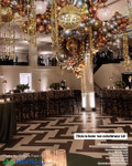 Mixed Metals Balloons and Curtains Ceiling Decor for 40th Party
ShopWildThings "Kate" Beaded Curtains added shimmer to this chic 40th birthday ceiling installation. These lightweight PVC curtains with metallic circles and crystal beads are easy to customize for any event. Available in silver or gold as full beaded curtains or columns, plus more metallic PVC styles to mix and match.
Glam Gold Silver Bronze Copper Black Dance Floor Decor