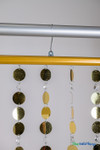 Hanging Metallic Gold PVC Discs and Clear Acrylic Crystals Make a Perfect Photo or Event Backdrop | ShopWildThings.com