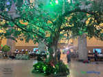 Transform any space into a verdant oasis with Artificial Greenery Branches by ShopWildThings. Just look at this breathtaking tree installation—it's like stepping into a dream! Let our team help you find the right Artificial Greenery Branches and Sprays for your next design!

Extra Large Faux Tree Design for Event Decor
