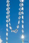 High end acrylic crystal garland with large emerald cut and princess cut beads used for upscale event styling and installations by ShopWildThings.com