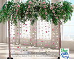 Greenery Display tall trees with hanging Green Leaves overhead decorated with flower garlands ShopWildThings Greenery Display tall trees with hanging Green Leaves overhead decorated with flower garlands ShopWildThings