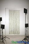 ShopWildThings behind the scenes beaded curtain photo shoot with green leaves handmade curtains