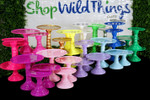 Colorful Adjustable Cake Stand Sets in front of Shimmer Sequin Wall ShopWildThings.com